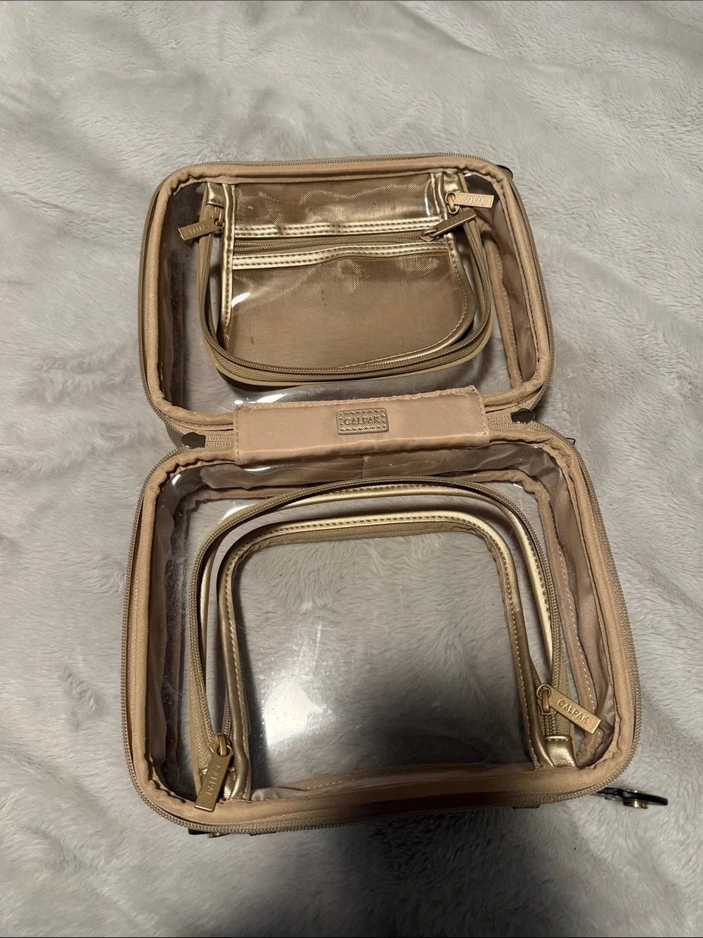 Calpak Clear Cosmetic Case with Beige Trim and Handles